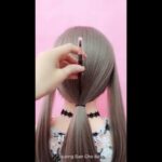 Il segreto per uno stile trendy: capelli sopra le spalle scalati